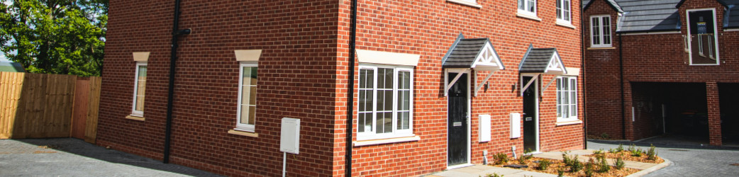 a semi detached house in a street